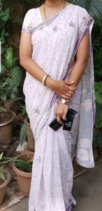 White and purple georgette saree