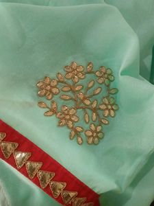 Elegant Mint Green Saree with Gold Embroidery