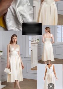 Elegant Cream V-Neck Midi Dress