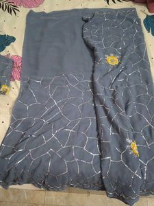 Elegant Grey Saree with Silver Details