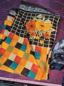 Vibrant Chequered Saree with Floral Motifs