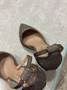 shiny pair of stelletoes