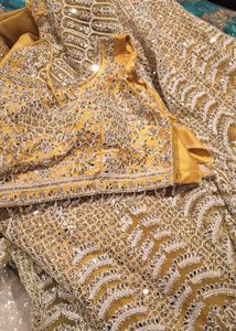Exquisite Yellow Mirror Work Lehenga Choli