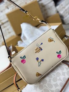 Coach Pebble Leather Wristlet with Veggie Print