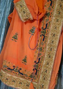Elegant Orange Embroidered Saree