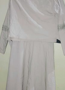 Elegant tunic with jacket and belt