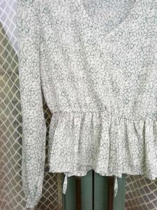 Chic Printed Peplum Blouse with Tie Neck