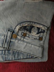 Light Wash Distressed Denim Jeans