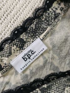 Stylish Snake Print Top with Star Appliques