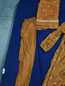 Elegant Orange Embroidered Kurta Set