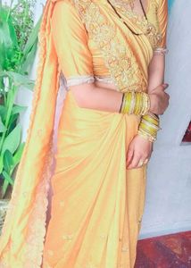 Elegant Yellow Saree with Embellishments