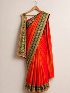 Elegant Orange Saree with Embellished Blouse