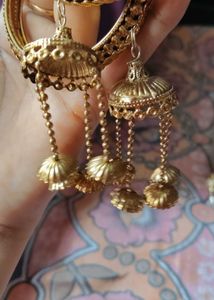 Elegant Gold-Tone Bangles with Tassel Charms