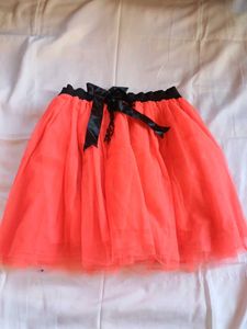 Vibrant Coral Tulle Skirt with Black Ribbon