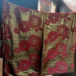 Elegant Gold and Red Floral Saree