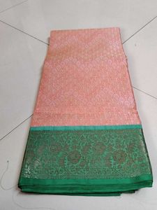 Elite orange green saree...