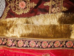 Embroidered Maroon Lehenga Choli with Pink Dupatta