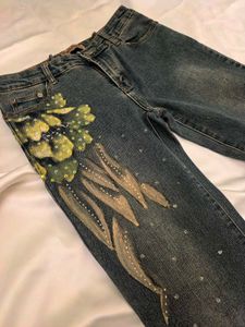 Unique Flared Jeans with Floral Design
