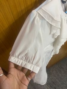Elegant White Ruffled Blouse