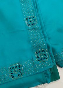 Elegant Teal saare nd blouse with Embellishments