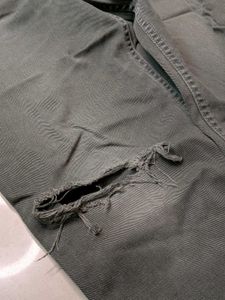 Distressed Levi's Denim Jeans