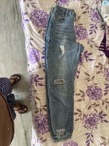Distressed Blue Denim Jeans