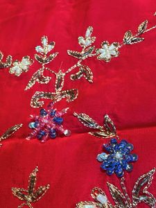 Vibrant pink suit with Silver Border