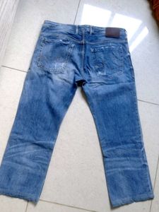 Distressed Blue Denim Jeans