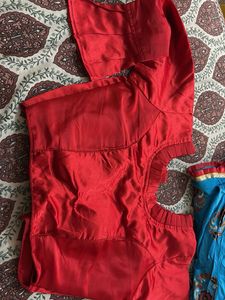Vibrant Red Ethnic blouse and sky color chaniya