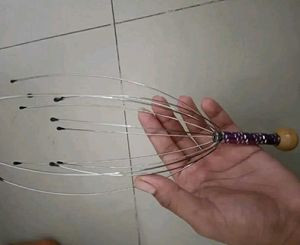 gua sha , jade roller and a head massager