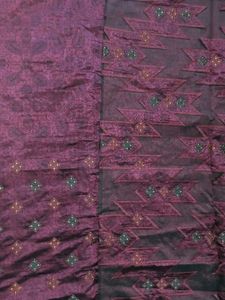 Elegant Purple Saree with Intricate Patterns