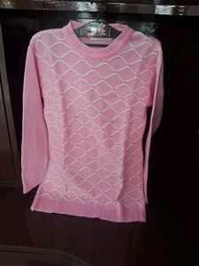 cute pink woole  top with white design and stones