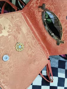 Elegant orange Embellished Sling Bag