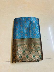 Blue Silk Saree with Gold Border