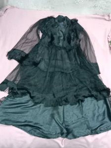 ethentic black three piece suit .