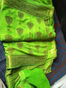 Vibrant Green Saree with Golden Motifs