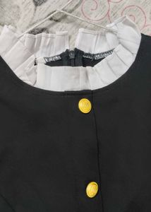 Chic Black Dress with White Details