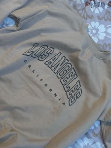 cozy beige sweatshirt
