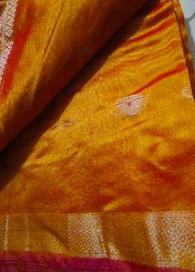 Elegant Orange Saree with Intricate Border