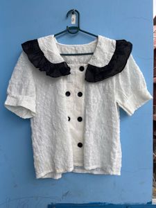 Chic White Top with Black Collar