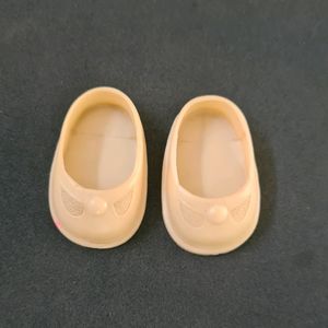 Off white shoes of a Doll from 1960s