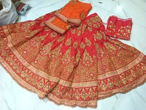 Stunning Orange &amp; Red Embroidered Lehenga Choli