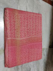 Elegant Pink Saree with Intricate Design