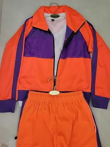 Bright Orange Joggers with Purple Stripes