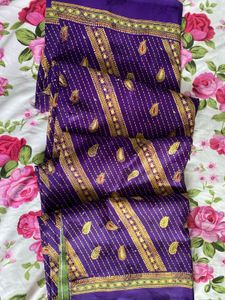 Vibrant Purple Saree with Gold Embroidery