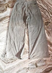 gray boot cut trouser, used. colour faded.