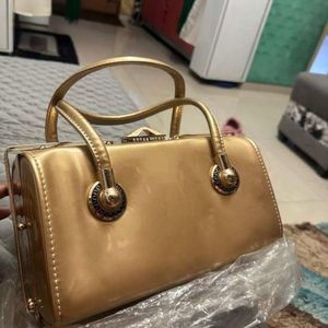 Imported Gold Bag for Tejasvi
