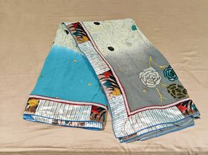 Chiffon saree with a print blouse
