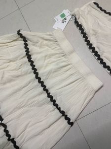 newme off-white tie-up skirt coord set