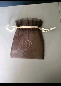 malabar gold n diamonds drawstring potli with logo